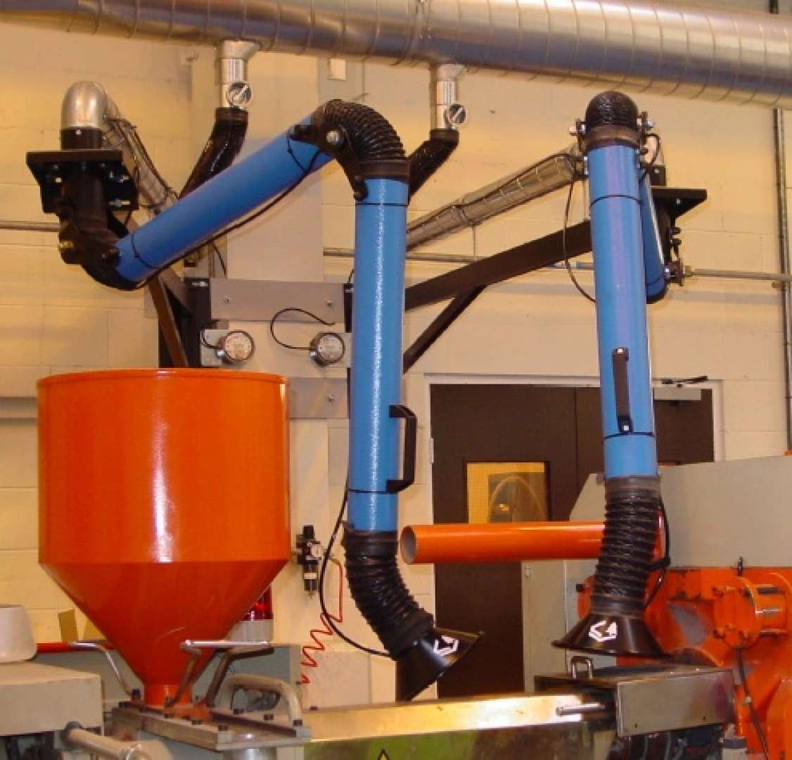 Dust extraction arms ideally situated to extract dust from a sanding application