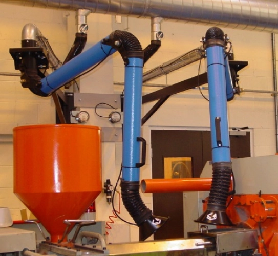 Dust extraction arms ideally situated to extract dust from a sanding application