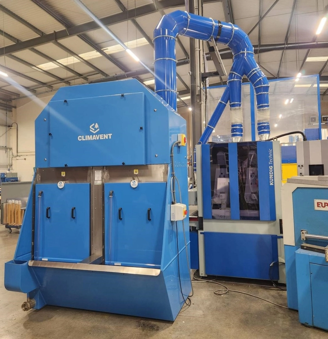 New, heavier duty wet collector unit connected onto an aluminium deburring machine