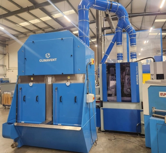 New, heavier duty wet collector unit connected onto an aluminium deburring machine