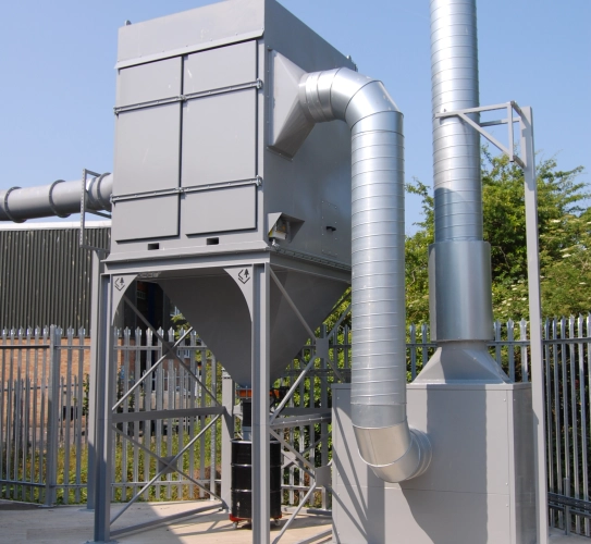 Externally sited reverse jet filtration unit used during thermal spray applications