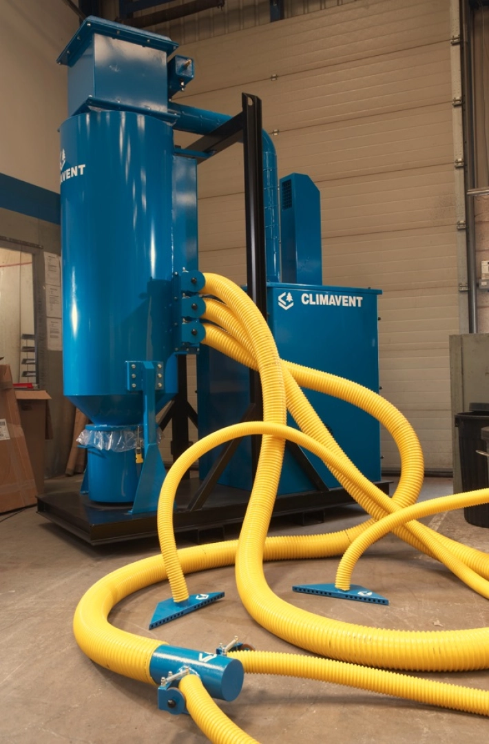 DH2000 High Vacuum Extraction Unit with hose connections and manifolds to allow for on tool extraction