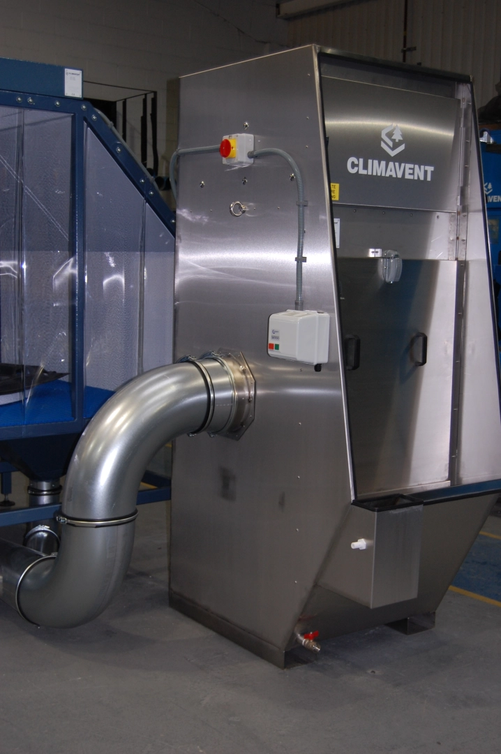 Stainless steel wet collector connected onto a down draught bench to be used for the extraction of highly explosive magnesium dust